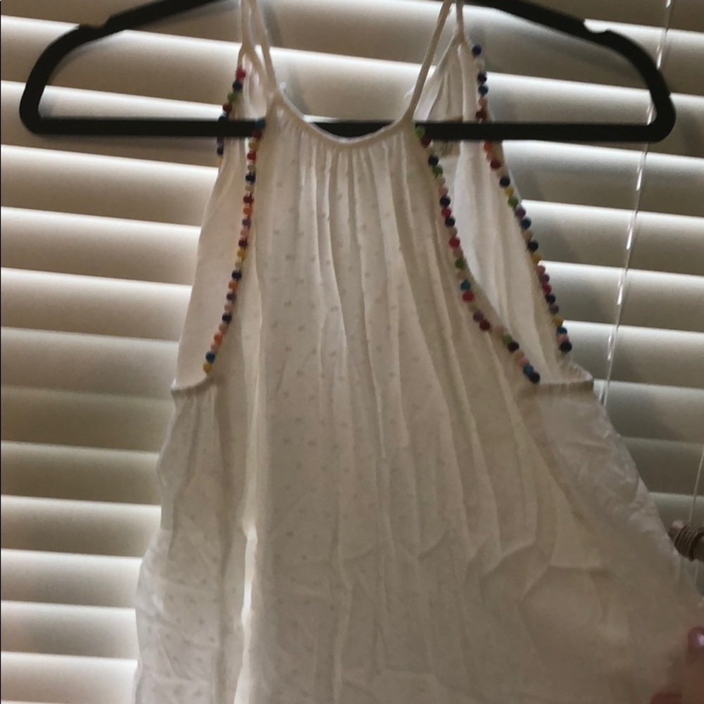White halter top with Pom Pom hem